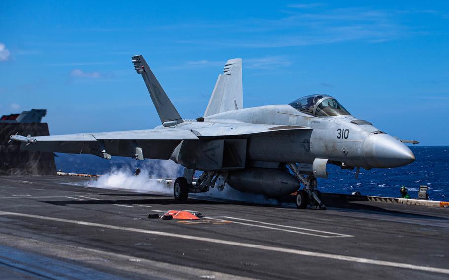 An F/A-18E Super Hornet launches from the flight deck of the aircraft carrier USS Nimitz on Feb. 23, 2023.