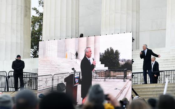 Robert F. Kennedy Jr. speaks on the steps of the Lincoln Memorial in January 2022 during a rally against vaccine mandates. MUST CREDIT: Matt McClain/The Washington Post)