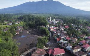 This drone photo shows the damage at a village affected by a flash flood in Tanah Datar, West Sumatra, Indonesia, on May 13, 2024.