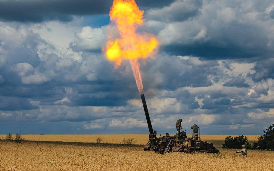 Russian soldiers fire a 2S4 Tyulpan self-propelled heavy mortar from their position at an undisclosed location in Ukraine, July 2022.