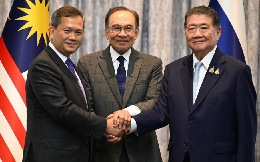 Malaysia’s Prime Minister Anwar Ibrahim, center, Cambodia’s Prime Minister Hun Manet left and Thailand’s acting Prime Minister Phumtham Wechayachai pose for photos.