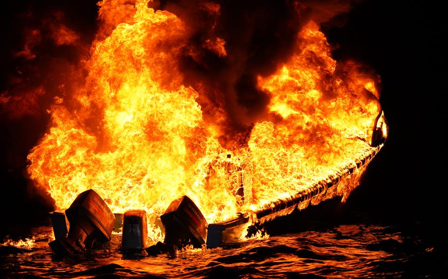 A boat in flames.