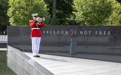 A soldier with the 3rd U.S. Infantry Regiment, also know as The Old Guard, helps dedicate the Wall of Remembrance at the Korean War Veterans Memorial in Washington, D.C., July 27, 2022.