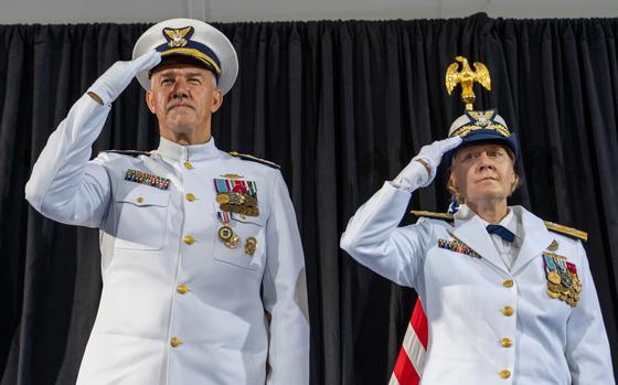 Adm. Linda Fagan relieves Adm. Karl Schultz as the 27th commandant of the Coast Guard during a change of command ceremony at Coast Guard headquarters June 1, 2022. Fagan is the first woman service chief of any U.S. military service. (U.S. Coast Guard photo by Petty Officer 1st Class Travis Magee)
