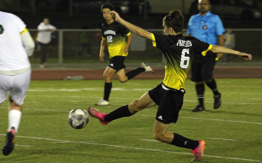 Kadena's Tyler Smith tries to settle the ball against Kubasaki during Friday's DODEA-Okinawa soccer match. The Dragons won 2-0.