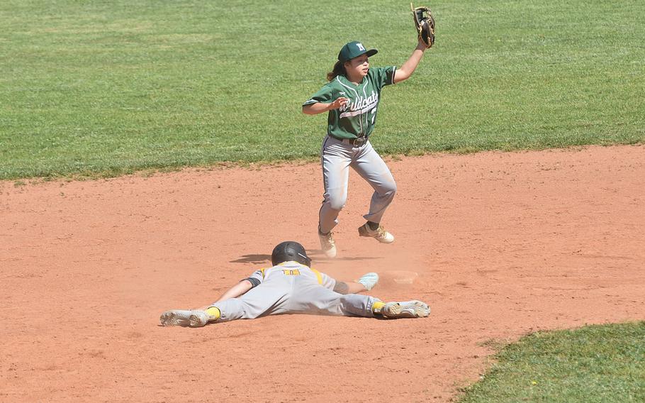 Vicenza’s Logan Sistare dives back into second base Saturday, April 20, 2024, before Naples shortstop Ella Grace can apply the tag.