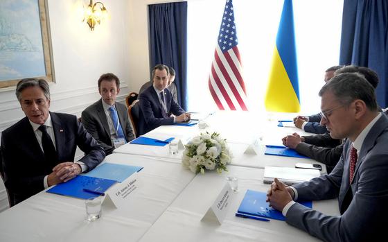 U.S. Secretary of State Antony Blinken, left, and Ukraine's Foreign Minister Dmytro Kuleba, right, attend a bilateral meeting on the sidelines of the G7 Foreign Ministers meeting on Capri Island, April 18, 2024. (Gregorio Borgia/Pool/AFP/Getty Images/TNS)