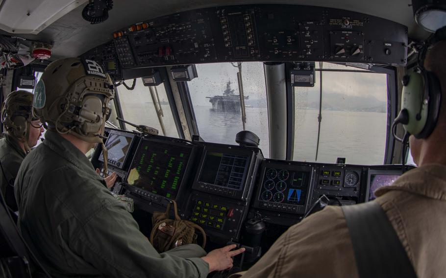 Sailors operate a landing craft assigned to the amphibious assault ship USS Makin Island in the South China Sea on April 11, 2023, during an annual exercise between the armed forces of the Philippines and U.S. military.