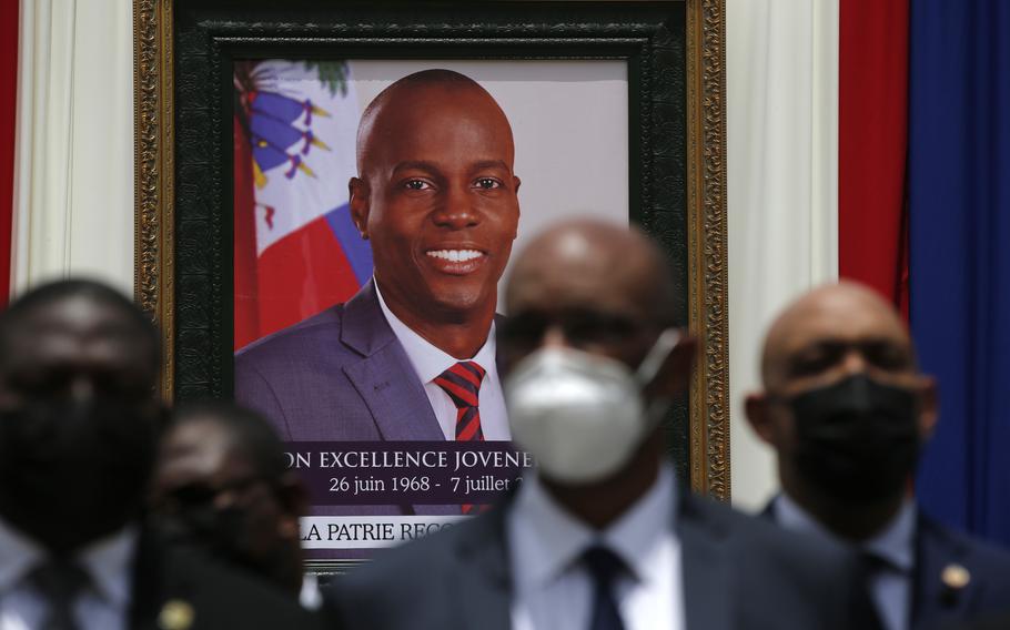 The portrait of late Haitian President Jovenel Moise hangs on a wall at the National Pantheon Museum in July 2021, during his memorial service in Port-au-Prince, Haiti. Moise was assassinated on July 7 at his home. 