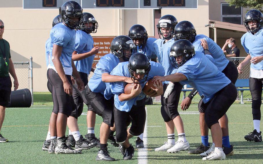 Running back Troy Abinsay is one of 26 players out for Osan football, the most since Jerome Learman took over as coach. But 15 are freshman and more than half have never played football before.