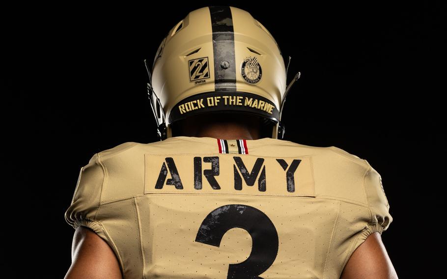 The division’s nickname “Rock of the Marne” is featured on the helmets.