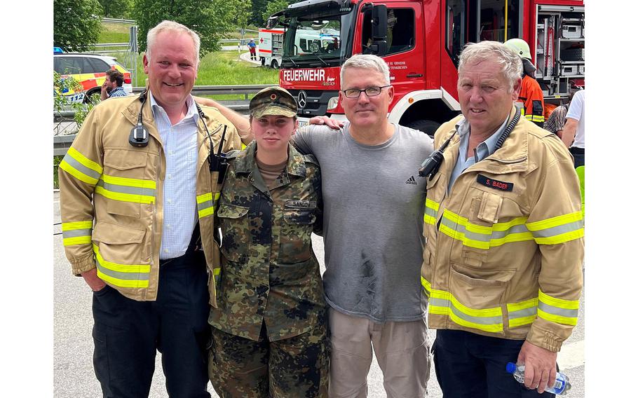 Army Col. Charles Bergman, second from right, was one of the first on the scene June 3, 2022, at a catastrophic train derailment near Garmisch-Partenkirchen, Germany, that killed five people and injured nearly 70. Bergman was awarded the Soldier's Medal on March 18, 2023, for his actions during the derailment. 