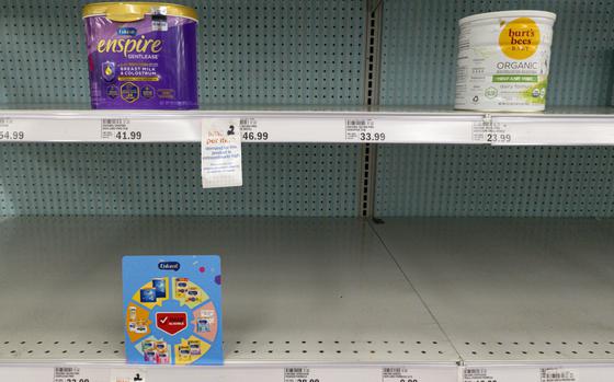 FILE - Baby formula are displayed on the mostly-empty shelves of a grocery store in Carmel, Ind. on May 10, 2022. On Wednesday, Jan. 25, 2023, Frank Yiannas, the federal Food and Drug Administration's top food safety official, resigned, citing concerns about the agency's oversight structure and the infant formula crisis that led to a nationwide shortage. (AP Photo/Michael Conroy, File)