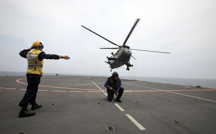 A Royal Navy Sea King helicopter takes off from HMS Albion during Exercise Auriga on July 14, 2010, near Camp Lejeune, N.C. This summer, divers found what they thought might be the Holy Grail of lost helicopters, a Navy Sea King famous for plucking Apollo astronauts from their capsules after moon-mission splashdowns. 