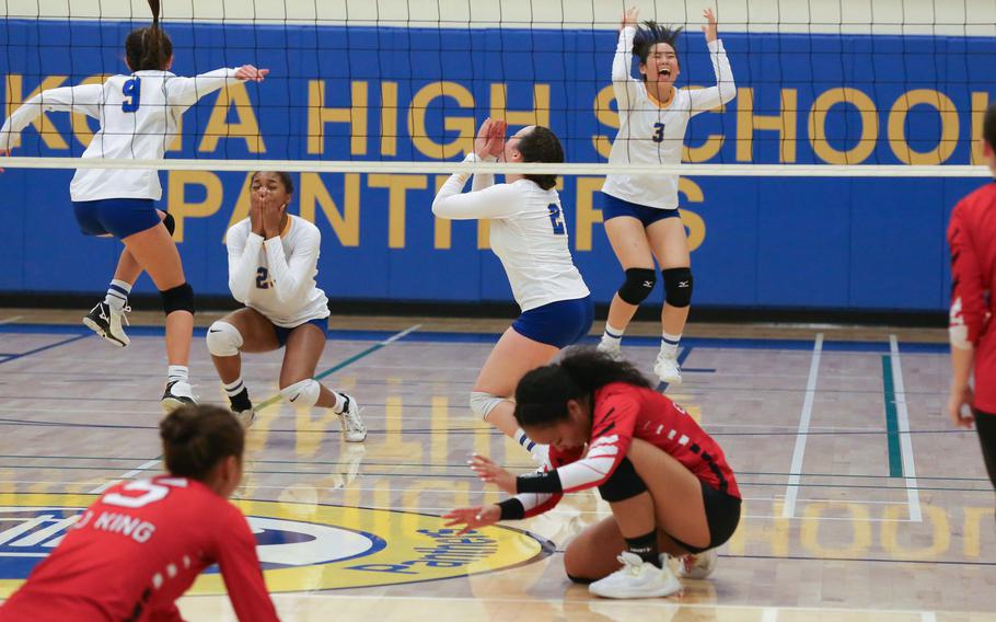 Yokota players celebrate their third Far East Division II girls volleyball tournament title and first since 2017, with a four-set victory over E.J. King.