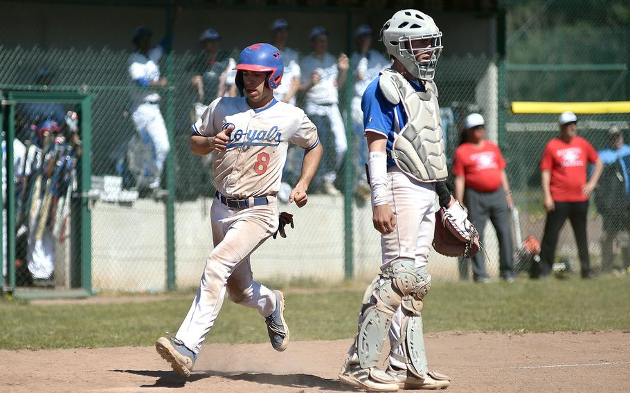 Conor McGinty scores a run.