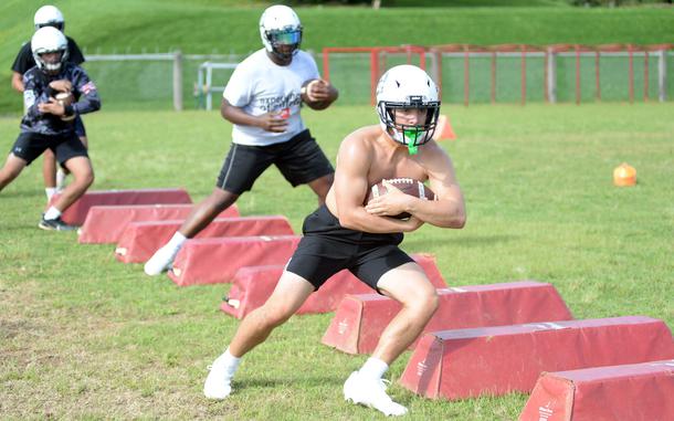Kubasaki junior running back Ethan Ferch will get escort in the form of senior lineman Isaiah Thompson.