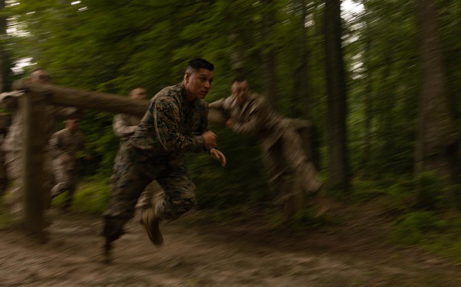 A Marine runs.
