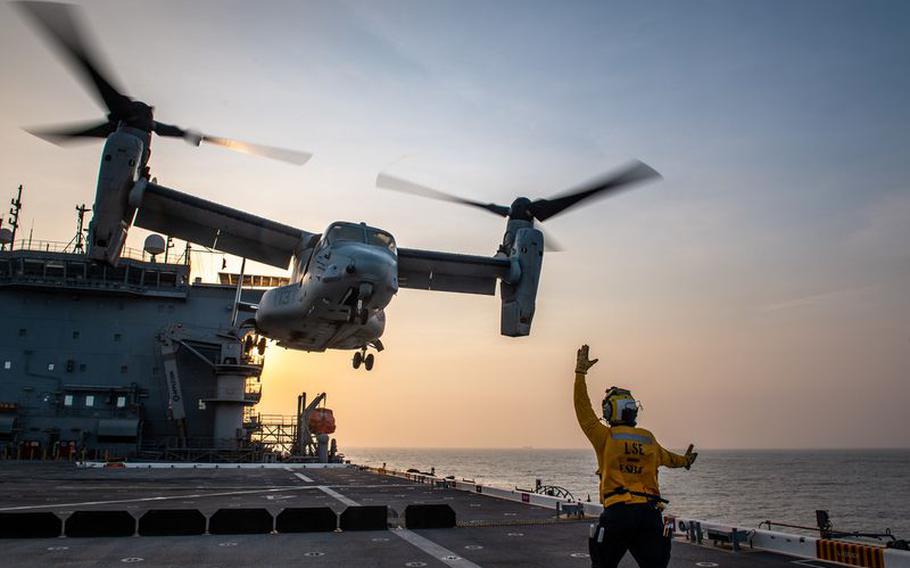 Blue Crew sailors handle flight operations on the USS Lewis B. Puller during their 2021 deployment. 