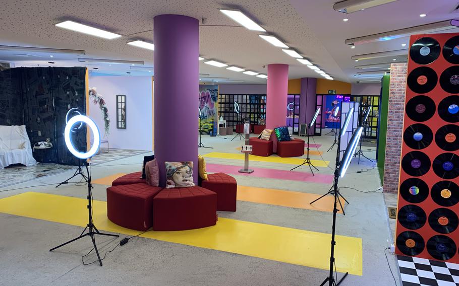 An army of ring lights stand ready for visitors to SnapMySelf, a ''selfie museum'' in downtown Kaiserslautern, on Thursday, Oct. 21, 2021.