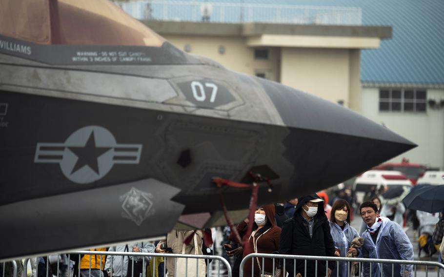 Festivalgoers check out an F-35B Lightning II stealth fighter on Friendship Day at Marine Corps Air Station Iwakuni, Japan, Saturday, April 15, 2023.