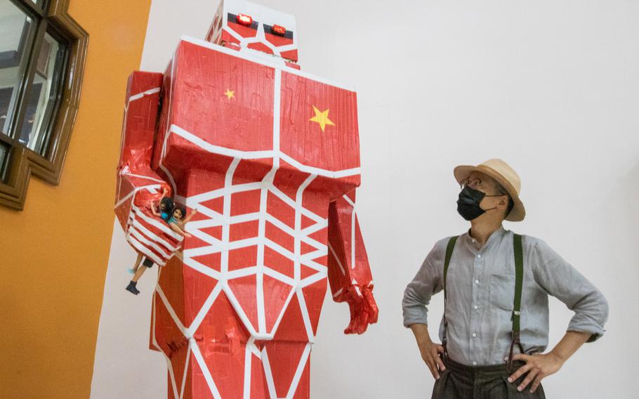 Kacey Wong, a 52-year-old Hong Kong dissident artist, shows his artwork “Attack of the Red Giant” at Taipei’s Chiang Kai-shek Memorial Hall to mark the 33rd anniversary of the June 4, 1989, Tiananmen massacre. 