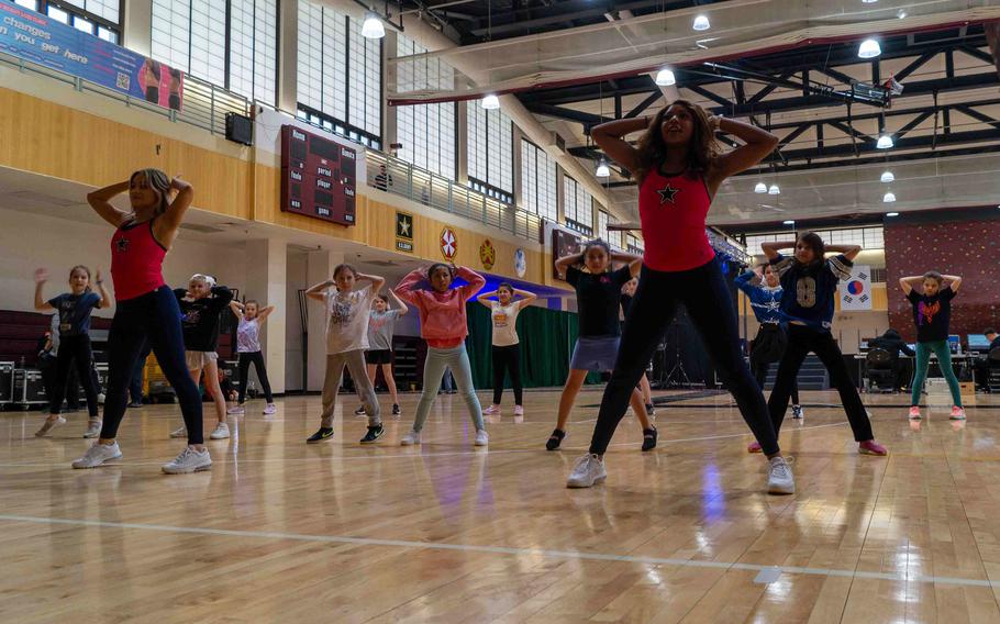 Dallas Cowboys Cheerleaders host youth cheer clinic at John W. Collier Fitness Center at Camp Humphreys, South Korea, Feb. 23, 2024.