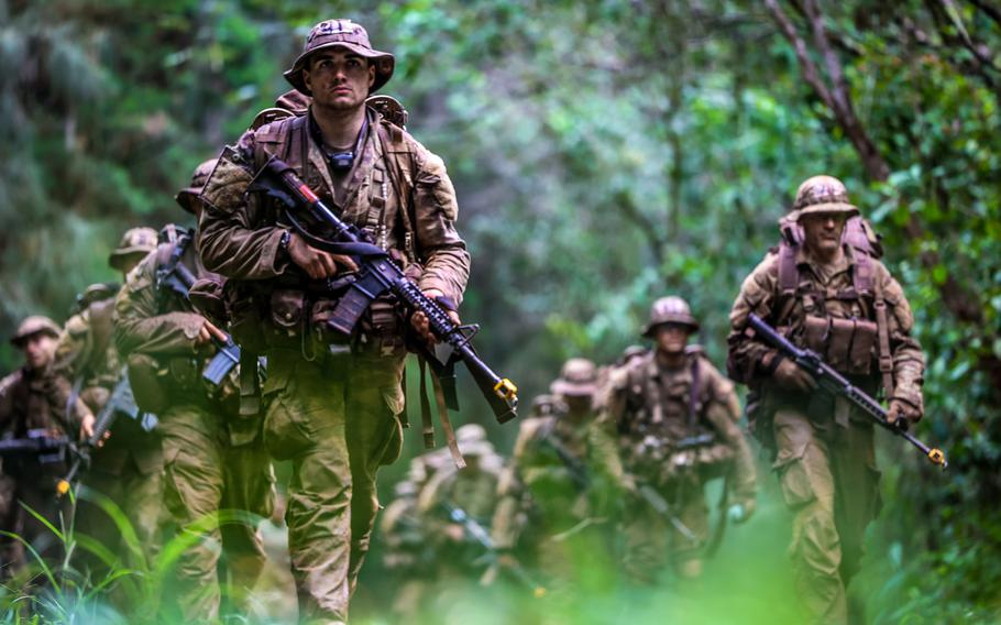 Soldiers wear sun hats, better known as boonies, during the the Jungle Operations Training Course at Schofield Barracks, Hawaii in 2021. Gen. James Isenhower III, commander of the 1st Armored Division, has authorized soldiers at Fort Bliss, Texas, to wear boonies.