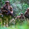 Soldiers wear sun hats, better known as boonies, during the the Jungle Operations Training Course at Schofield Barracks, Hawaii in 2021. Gen. James Isenhower III, commander of the 1st Armored Division, has authorized soldiers at Fort Bliss, Texas, to wear boonies.