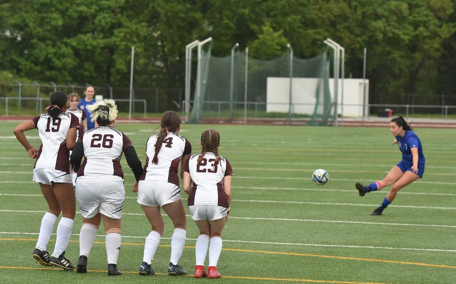 Vilseck players form a wall to defend against a free kick from Wiesbaden's Sophia St. Laurent during a game in Wiesbaden, Germany, on May 4, 2024.