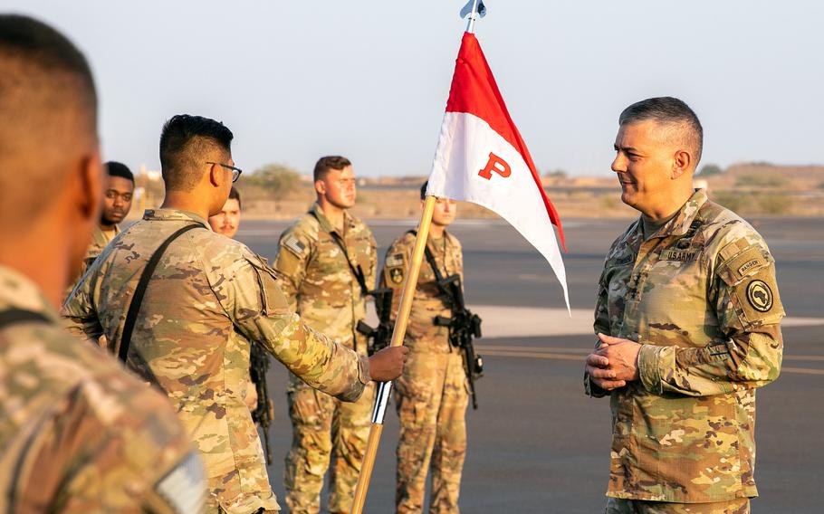 Retired Army Gen. Stephen Townsend, then-commander of U.S. Africa Command, greets soldiers at Camp Lemonnier, Djibouti, in February 2022. The push to get U.S. troops back into Somalia was based in part on an inflated threat assessment from Townsend about the danger from al-Qaida-linked terrorists in the country, according a think tank argued in a report released this week. 