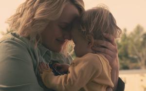 Elisabeth Moss’ “Handmaid’s Tale” character June and a baby. 