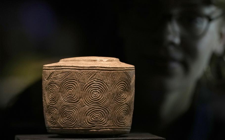 The Burton Agnes chalk drum which was found in a child’s grave, 3000 BCE, on display at the ‘The World of Stonehenge’ exhibition at the British Museum in London, Monday, Feb. 14, 2022. The exhibition which displays objects and artifacts from the era of Stonehenge opens on Feb. 17 and runs until  July 17, 2022.  The exact use of the drum is yet to be explained.