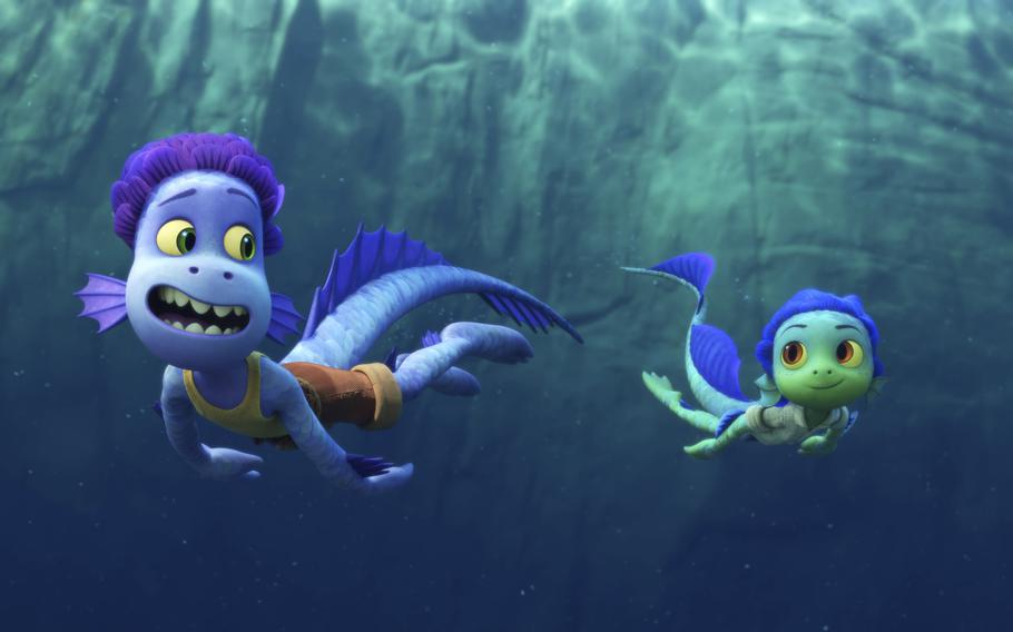 Alberto, voiced by Jack Dylan Grazer, left, and Luca, voiced by Jacob Tremblay, try to navigate the waters and the land in the animated film “Luca.”