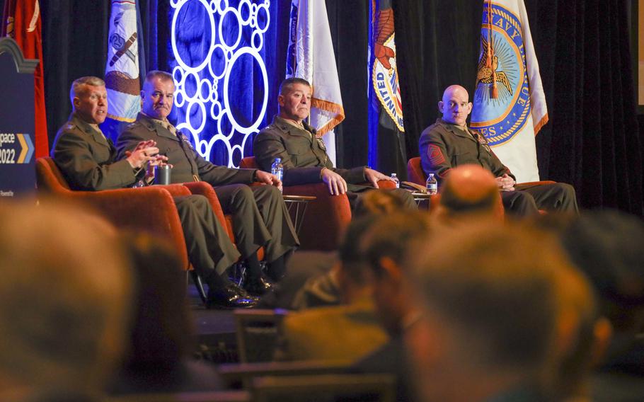 Gen. Eric Smith, the assistant commandant of the Marine Corps, left, speaks on a Force Design 2030 panel during the 2022 Sea-Air-Space Exposition at National Harbor, Md., April 4, 2022. The panel discussed changes taking place to shape the Marine Corps to face emerging threats.