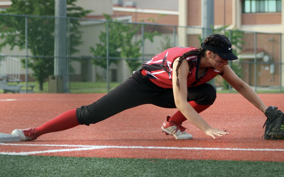 King third baseman Nylire Costa snags the ball against Perry.