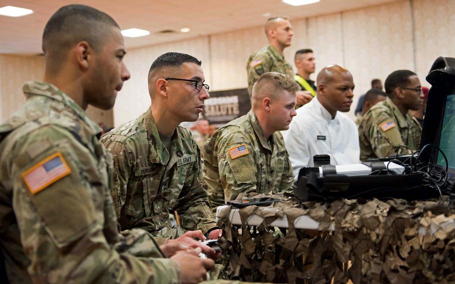 Soldiers participate in a “Pros vs GI Joes” event at Joint Base Myer-Henderson Hall, Va., in 2017. The annual "Madden NFL" tournament sponsored by the United Service Organization starts in September, and the top two finishers will win tickets to Super Bowl LVIII in Las Vegas.