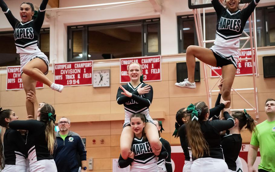 The Naples High School cheer team performs during the 2023 DODEA-Europe Cheerleading Championships at Kaiserslautern High School on Friday, Feb. 18.