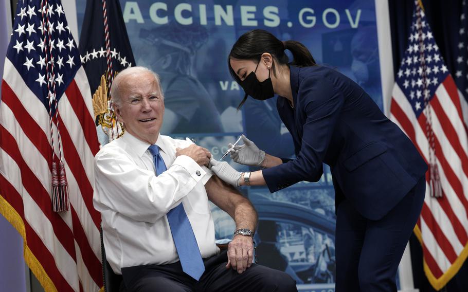 U.S. President Joe Biden receives his updated COVID-19 vaccine and delivers remarks in the South Court Auditorium at the White House in Washington, D.C., on Tuesday, Oct. 25, 2022. 