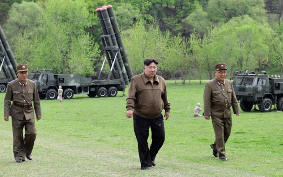 An image from the state-run Korean Central News Agency shows North Korean leader Kim Jong Un overseeing a missile drill on April 22, 2024.