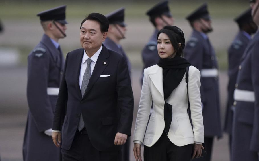 South Korea’s President Yoon Suk Yeol and first lady Kim Keon Hee, arrive at Stansted Airport, Essex, England, Monday Nov. 20, 2023, for the start of his state visit to the UK. 