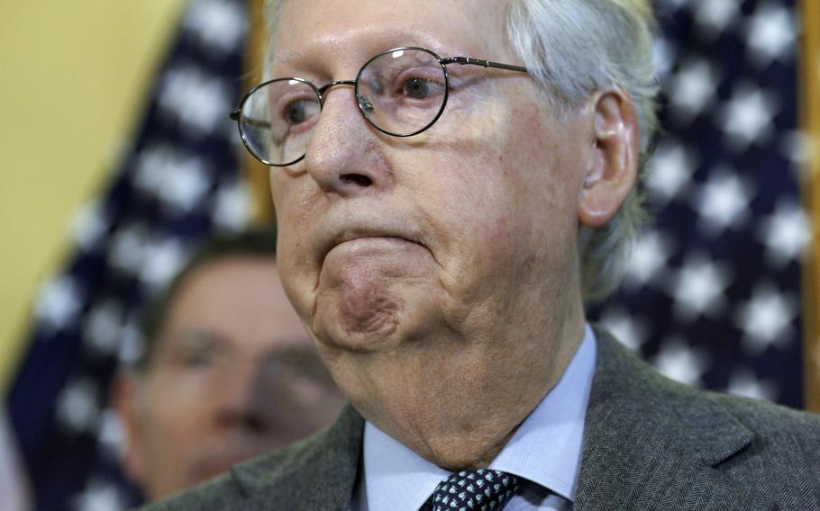 Senate Minority Leader Mitch McConnell (R-KY), with GOP senators, speaks to the media after the Republican Weekly Policy Luncheon on Capitol Hill in Washington, D.C., on Tuesday, Feb. 15, 2022.