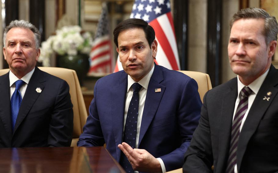 Steve Witkoff, Marco Rubio and Mike Waltz seated at a table, with Rubio appearing to be mid-sentence and gesturing.