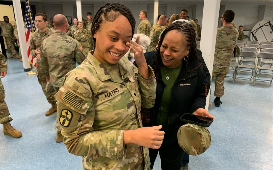 Spc. Jayla Mathis shares a laugh with her mom, Jaymie Mathis, during a welcome home ceremony for the 54th Quartermaster Company April 12, 2024, at the Family Life Center on Fort Gregg-Adams, Va.