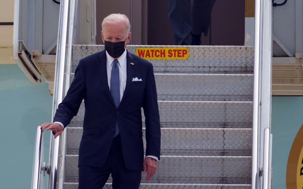President Joe Biden departs Air Force One at Yokota Air Base in western Tokyo, Sunday, May 22, 2022.