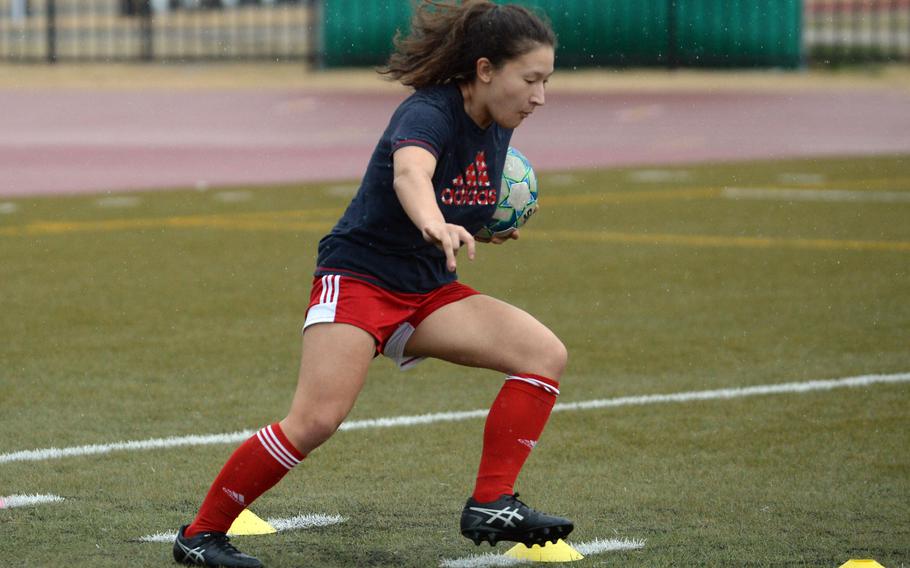 Junor Sasha Malone is one of nine returning players for Matthew C. Perry's girls soccer team.