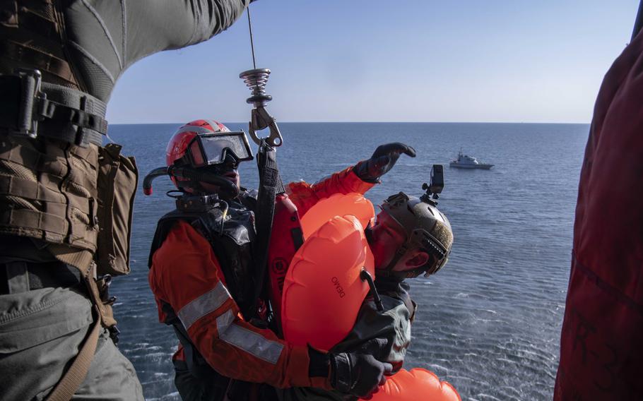 A U.S. Navy helicopter from USS Mount Whitney conducts recovery exercises with U.K. sailors in the Baltic Sea, June 7, 2023, during exercise Baltic Operations 2023. Sailors are also testing unmanned boats and drones that may reduce risk during rescues at sea.