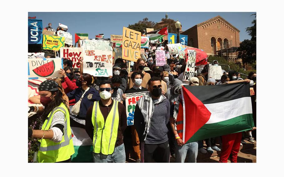 Pro-Palestinian protesters rally on the UCLA campus on Wednesday, May 1, 2024, in Los Angeles. 