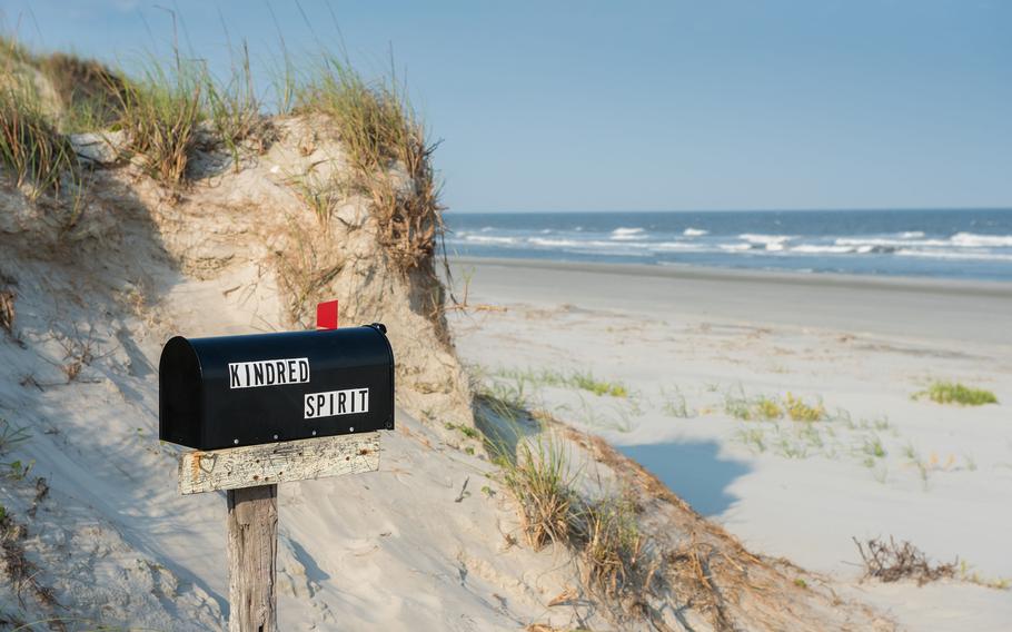 The Kindred Spirit Mailbox on Bird Island near Sunset Beach is an iconic symbol of the Brunswick Islands. The mailbox contains journals that visitors can write their innermost thoughts in for others to read. 