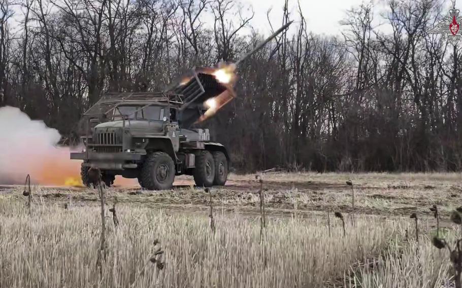 Russian rocket launcher fires missile at Ukrainian troops.